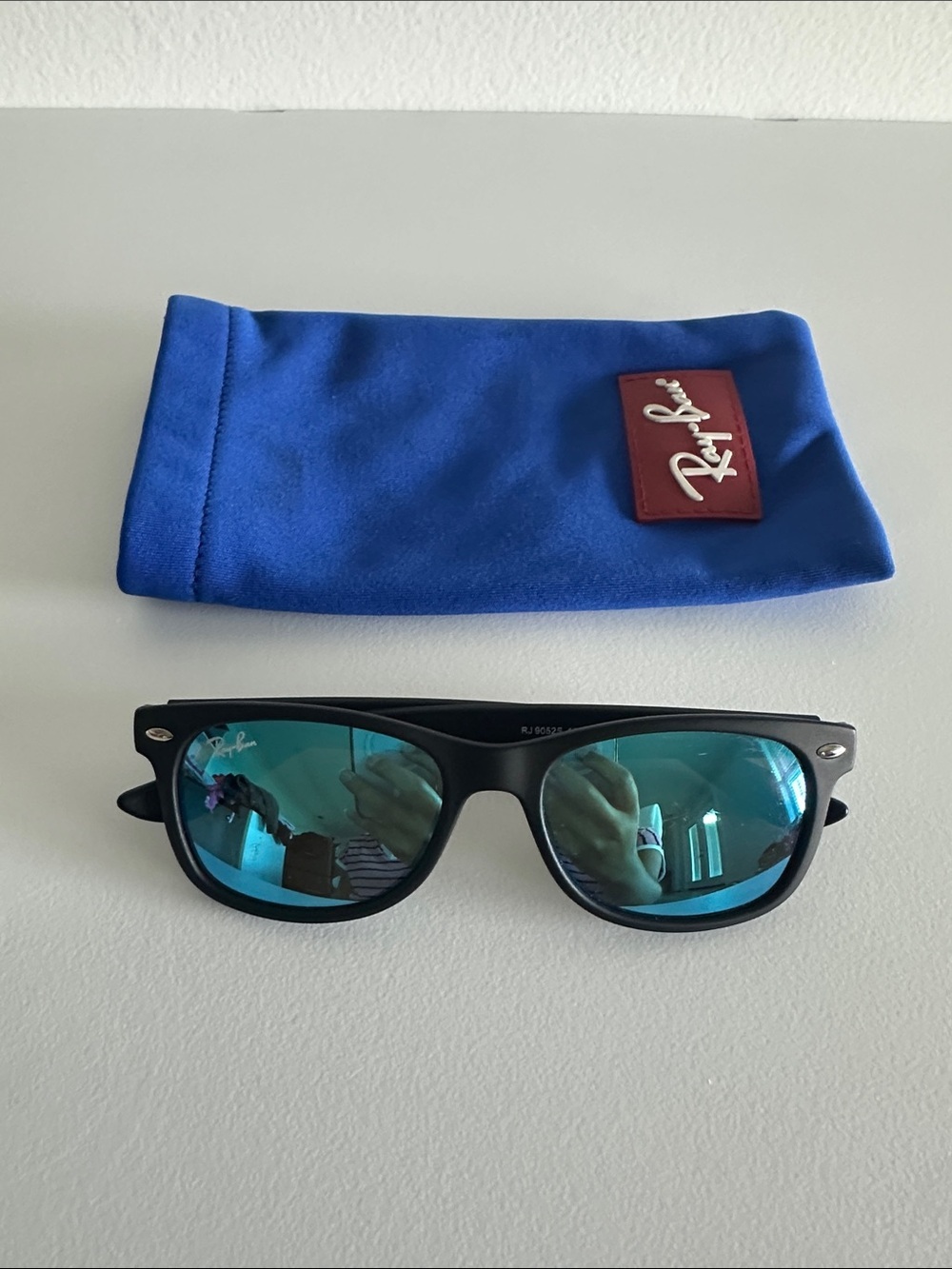 Ray-Ban kids polarized glasses. Black Frame Sunglasses with Blue Mirrored Lenses